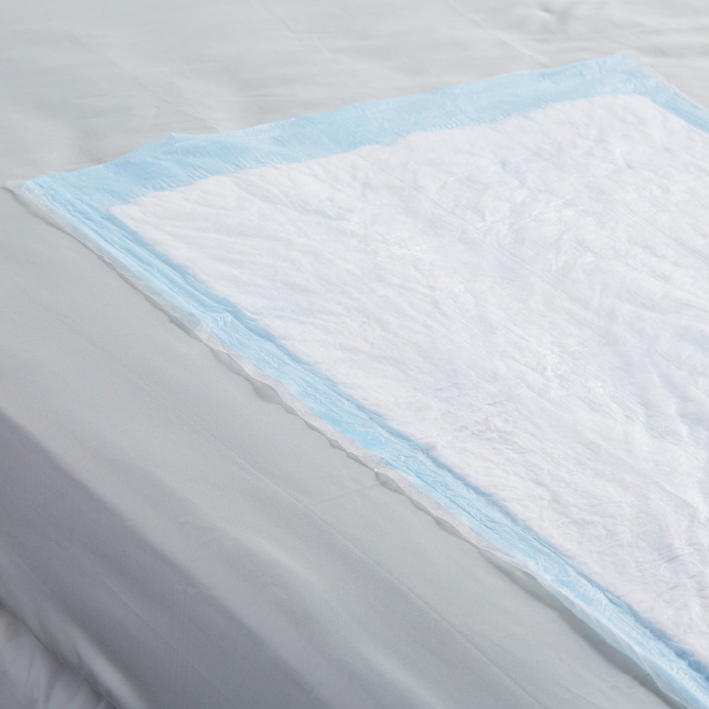 UNDERPAD, WINGS FLUFF 23"X36" (10/BG 15BG/CS)